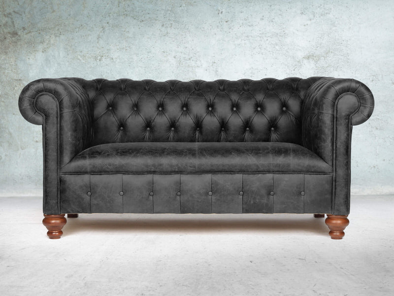 Peggy 2 Seat Chesterfield Sofa In Black Vintage Leather