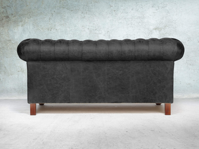 Peggy 2 Seat Chesterfield Sofa In Black Vintage Leather