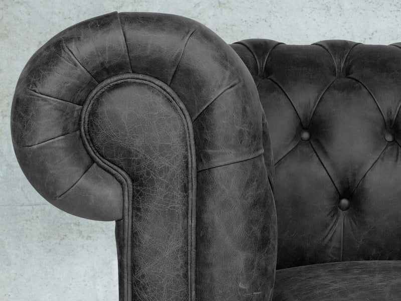 Peggy 2 Seat Chesterfield Sofa In Black Vintage Leather